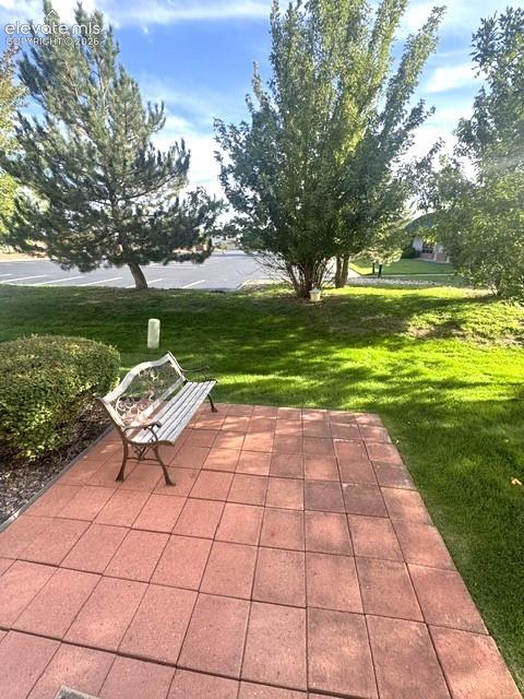 Image 16 of 49: Walkout Patio from Primary Bedroom