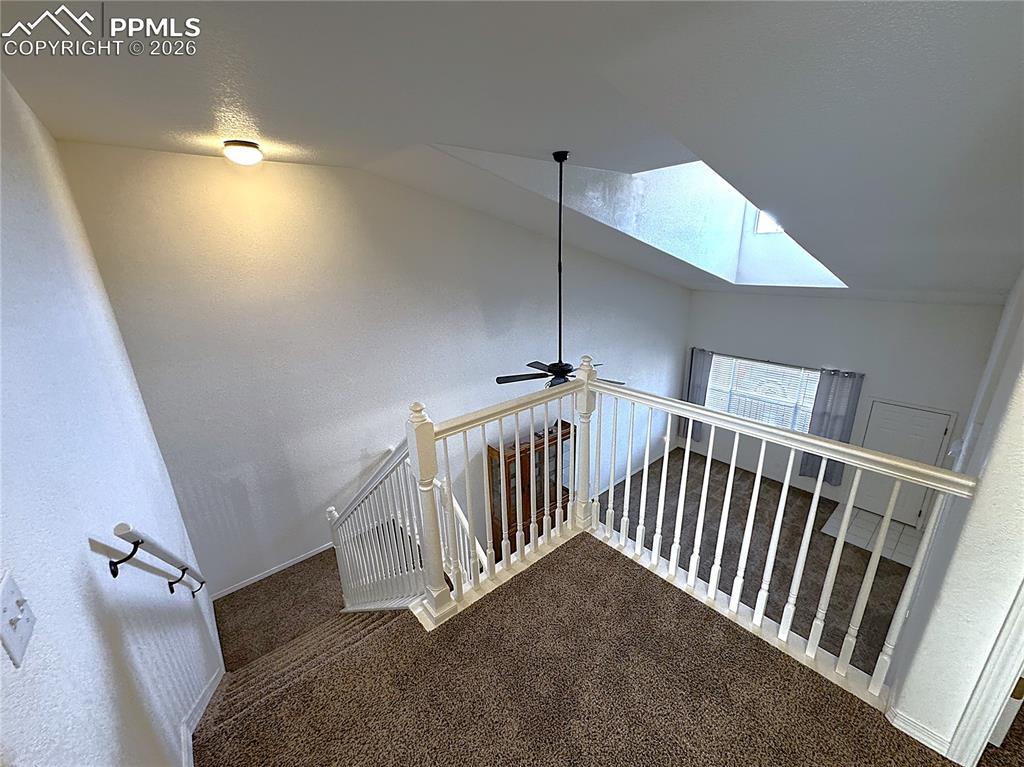 Image 18 of 49: Vaulted ceiling with Loft overlooking Great Room area