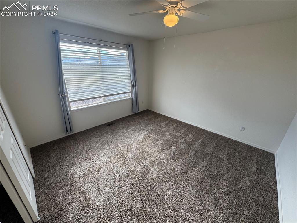 Image 25 of 49: Large Upper-level 3rd Bedroom