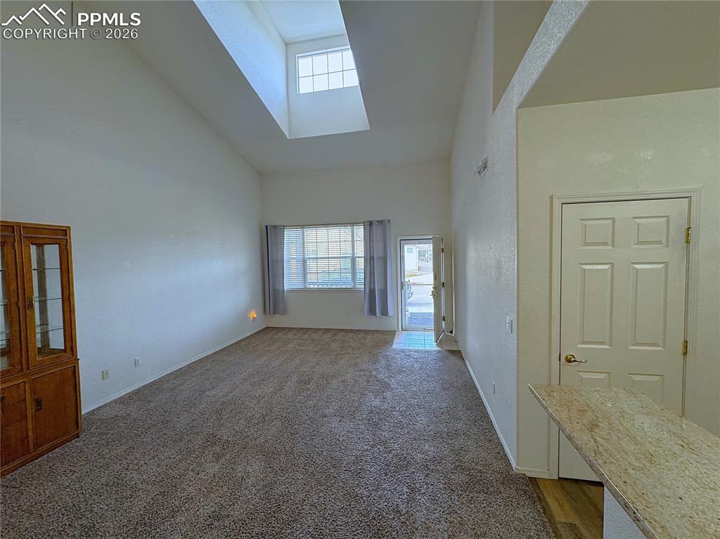 Image 4 of 49: Living and Dining Room space