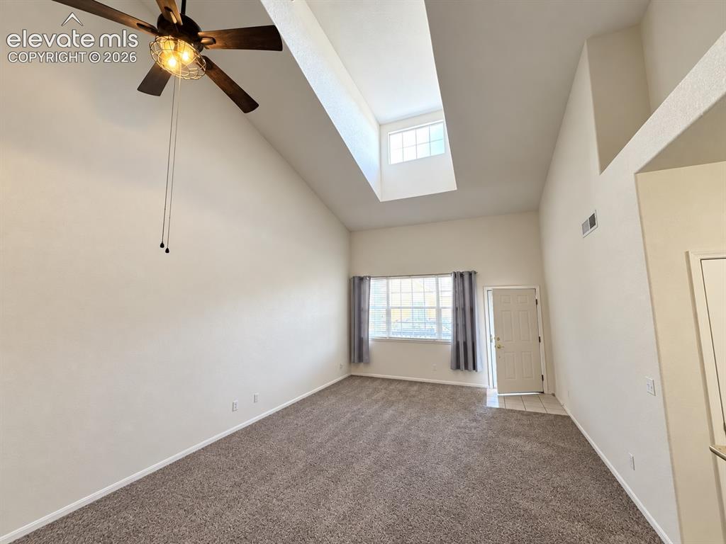 Image 4 of 49: Bright and Open Living and Dining Area