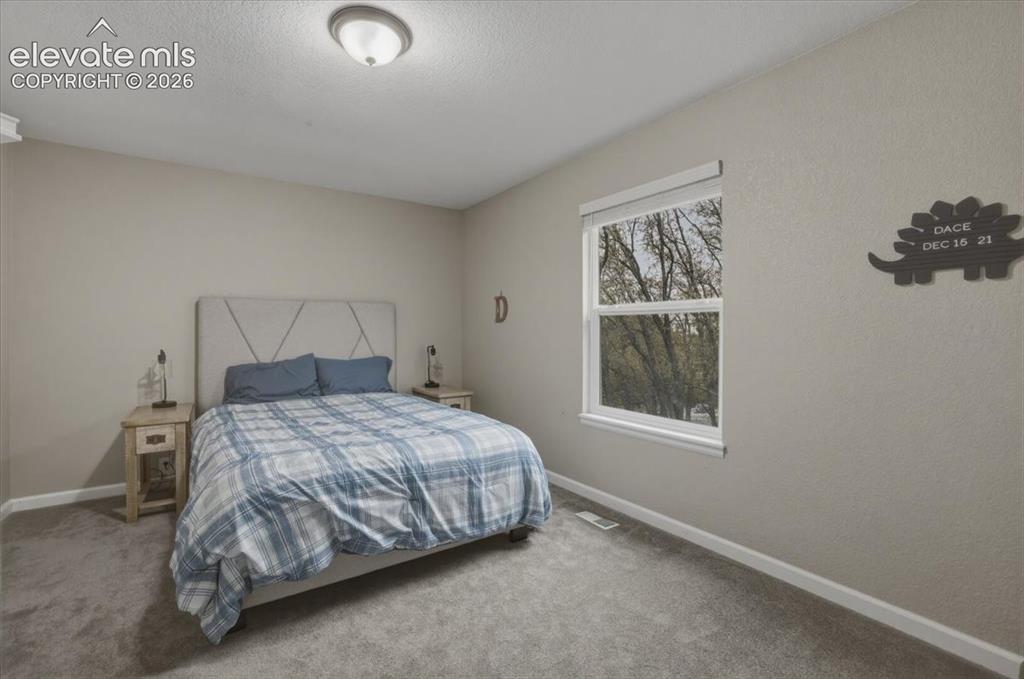 Image 18 of 36: Bedroom