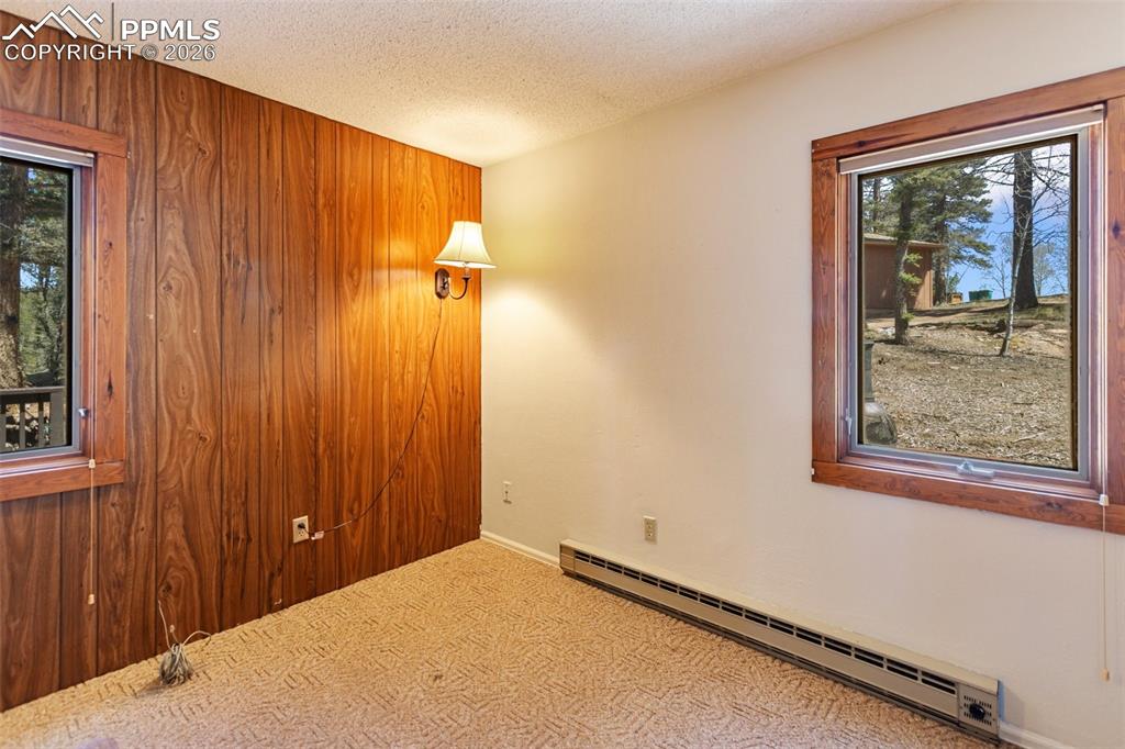 Image 20 of 43: Primary Bedroom with deck