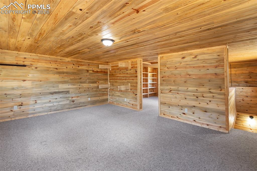 Image 32 of 43: Recreation building and storage shed