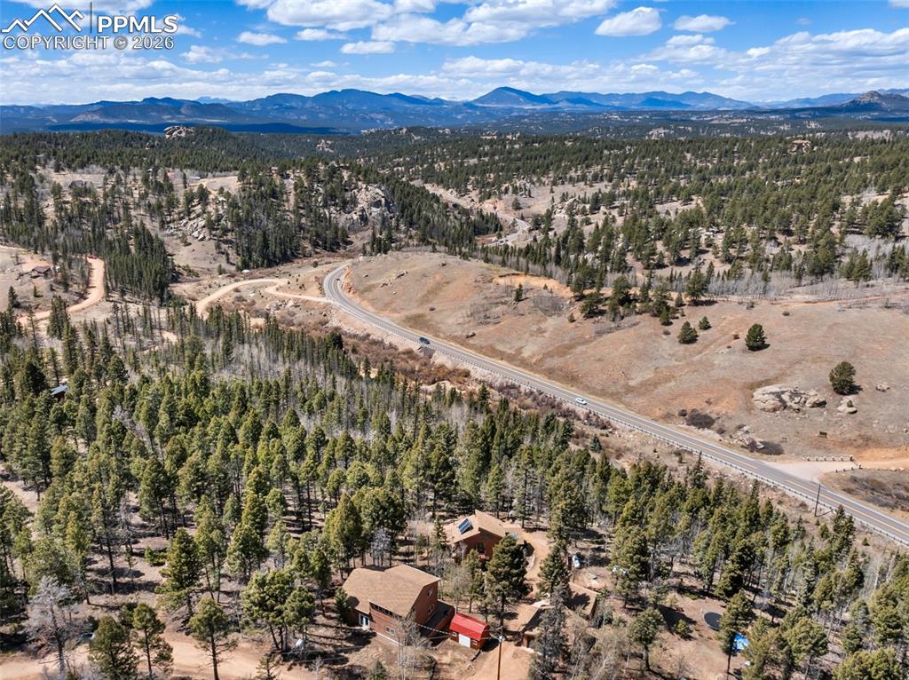Image 35 of 43: Game room and dry bar