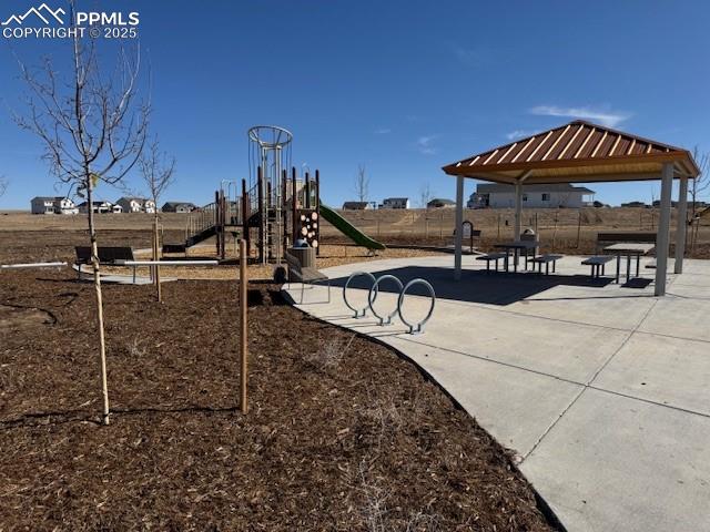 Image 11 of 15: Communal playground featuring a gazebo