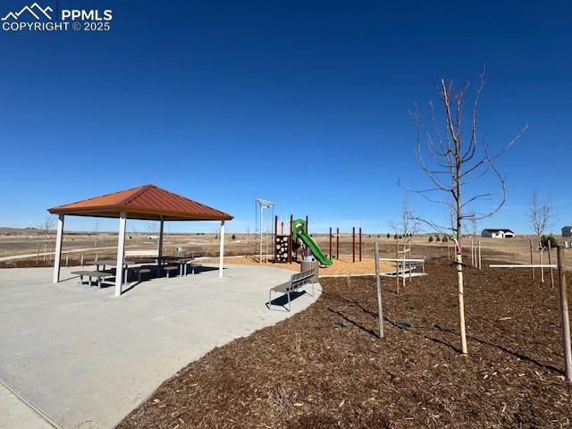 Image 12 of 15: Communal playground with a gazebo