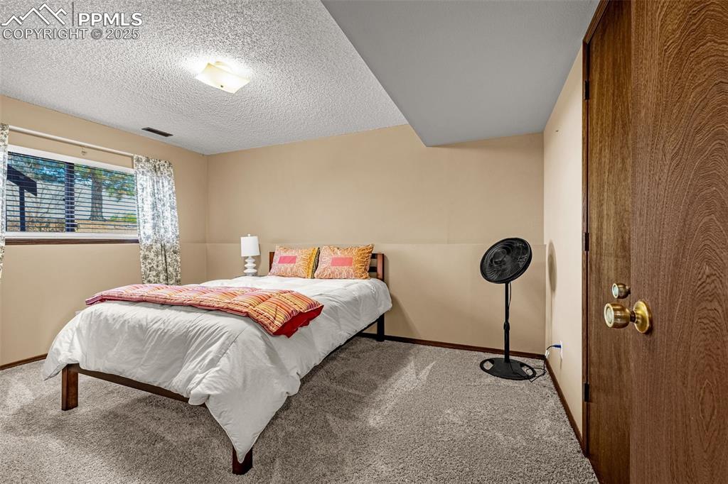 Image 16 of 26: Bedroom