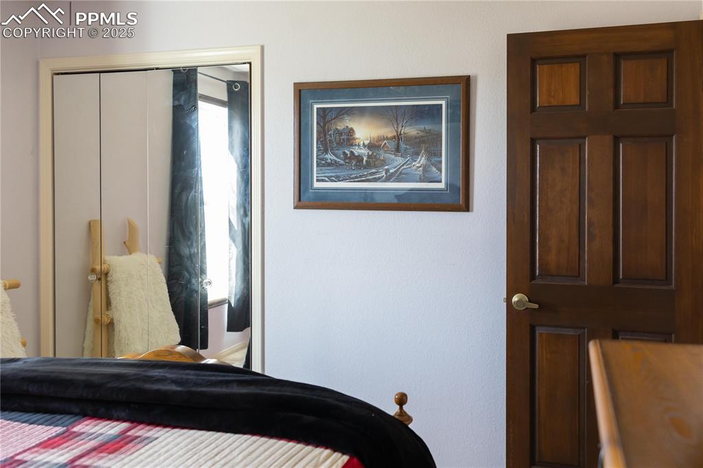 Image 32 of 49: Bedroom with a closet