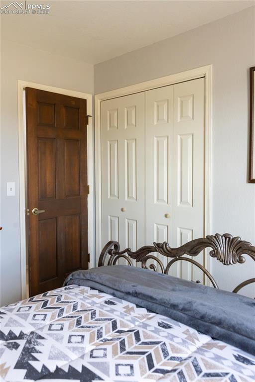 Image 35 of 49: Bedroom with a closet