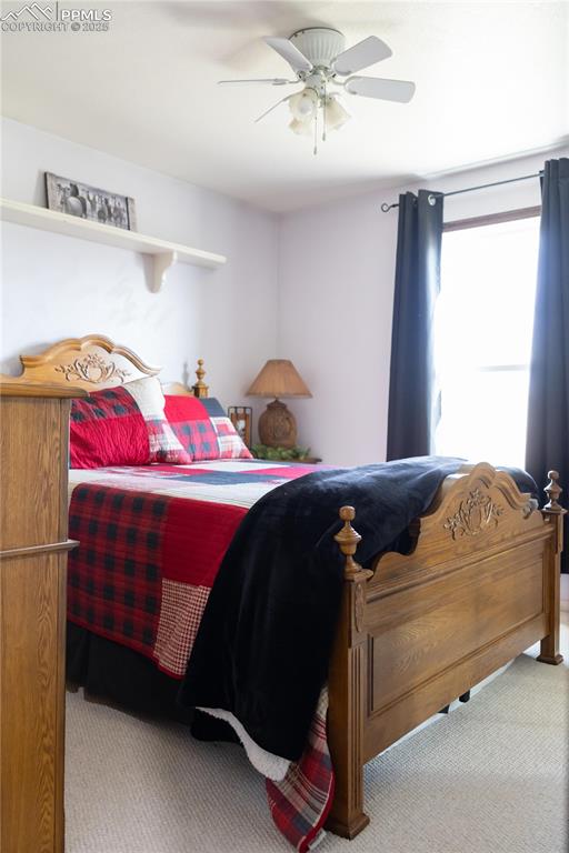 Image 42 of 49: Bedroom featuring carpet and a ceiling fan