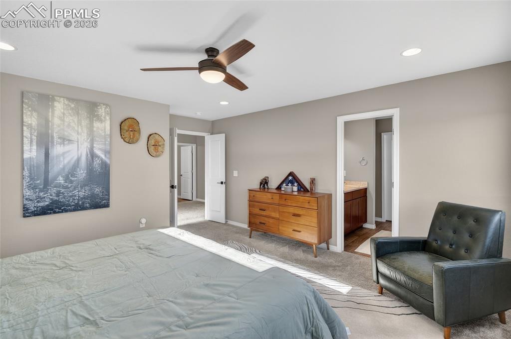 Image 19 of 38: Bedroom with carpet flooring, recessed lighting, a ceiling fan, and connect