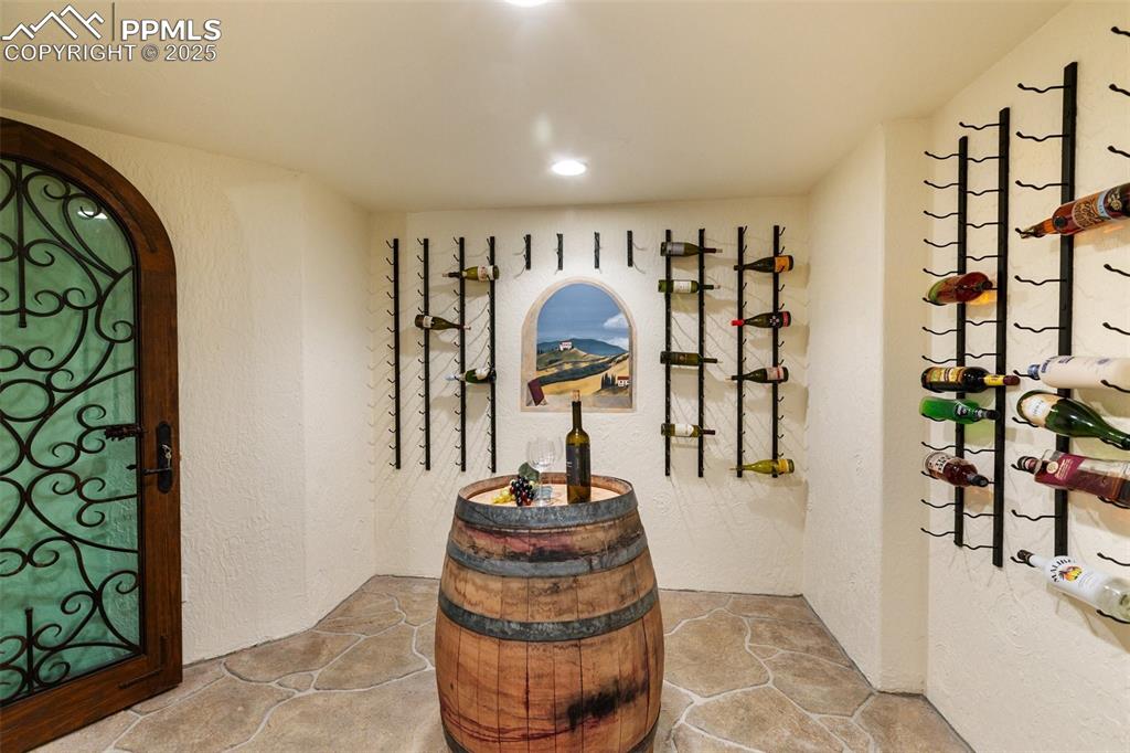 Image 43 of 50: Wine cellar to accommodate with the full bar.