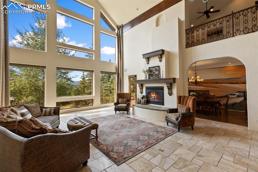 Image 7 of 50: Stunning views of Pikes Peak from the Main Living Room