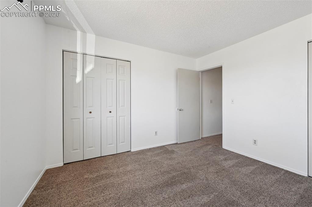 Image 15 of 27: Bedroom