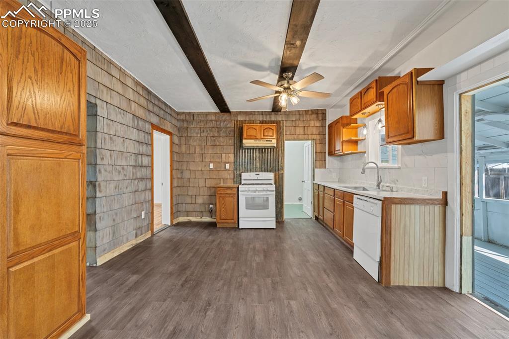 Image 13 of 34: Kitchen with tons of character and Pantry for extra storage