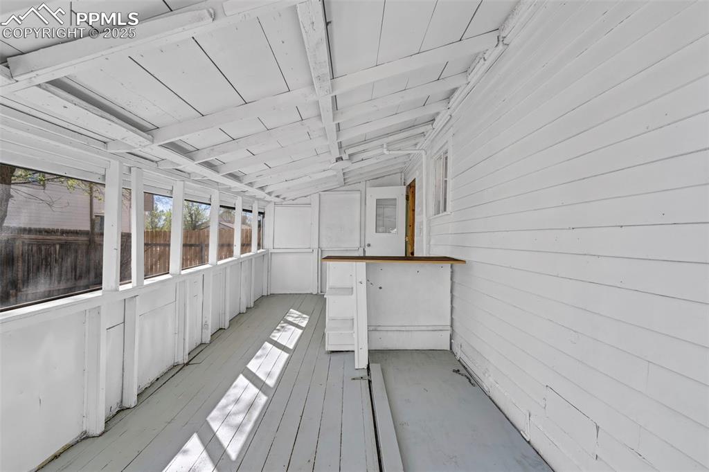 Image 16 of 34: Screened Porch includes access to basement