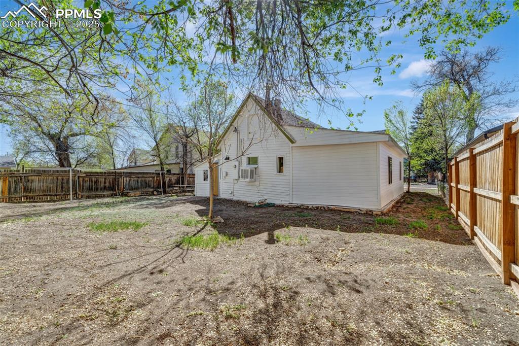 Image 30 of 34: Backyard has plenty of room for expansion, yard games, firepit, or addition