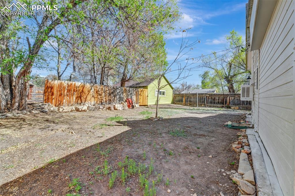 Image 31 of 34: Plenty of space in the fully fenced backyard