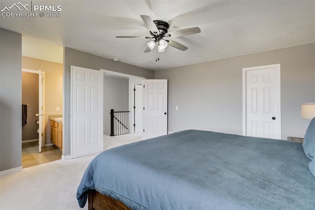 Image 13 of 42: Primary Bedroom with 5-piece ensuite