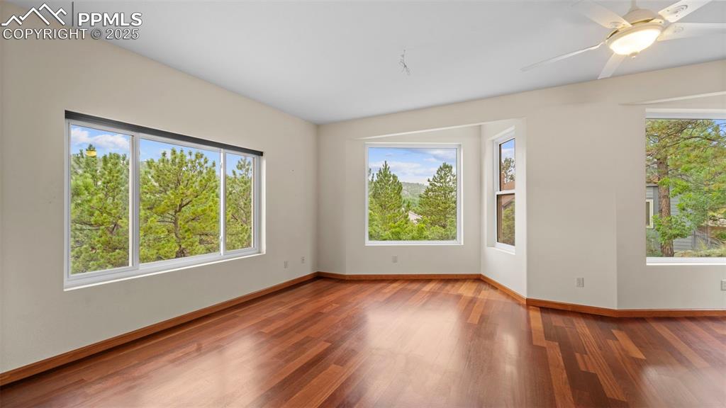 Image 3 of 42: Exquisite Brazilian cherry hardwood radiates warmth and sophistication thro