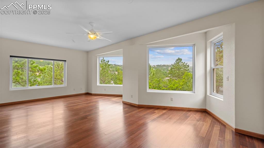 Image 7 of 42: Multiple large windows are strategically placed to capture the stunning vie