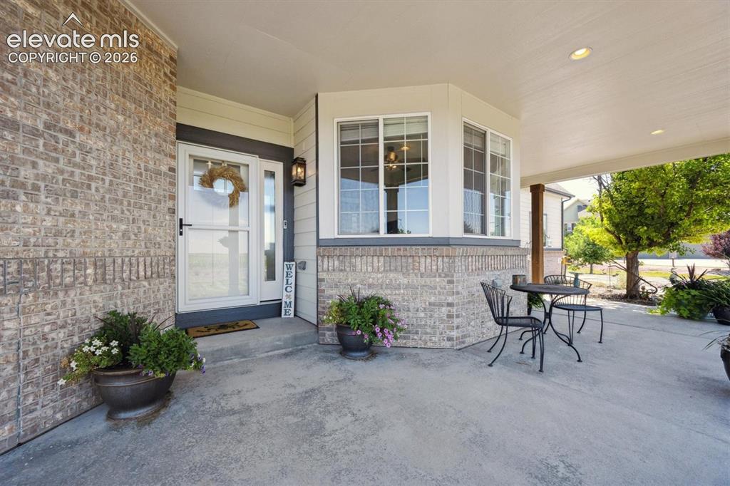 Image 32 of 46: Covered front porch