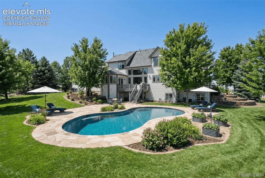 Image 43 of 46: Virtually staged image showing a potential pool location in the backyard.