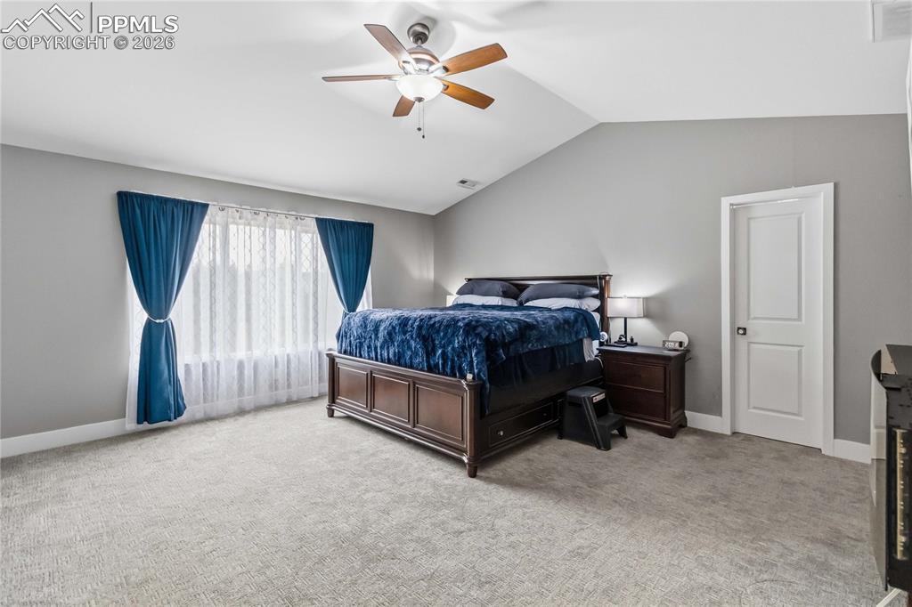 Image 20 of 43: Master Bedroom with lots of light and room for furniture. Walk-in Closet an