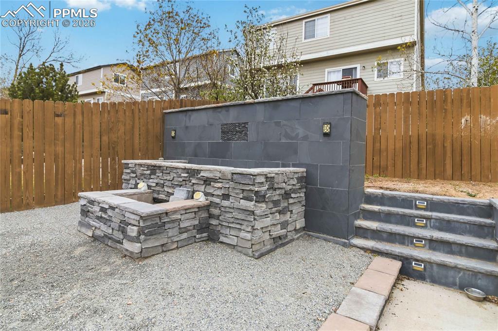 Image 41 of 43: Check out the custom water feature! Easy to turn on and enjoy!