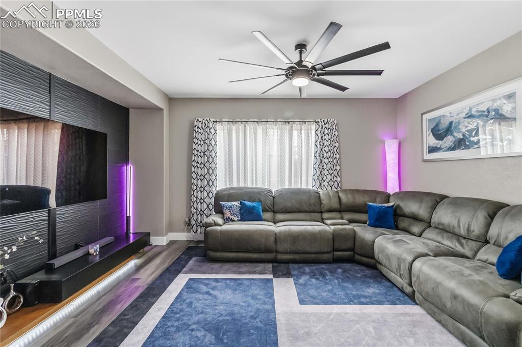 Image 8 of 43: Large living room to with room for your wrap around sectional for movie nig