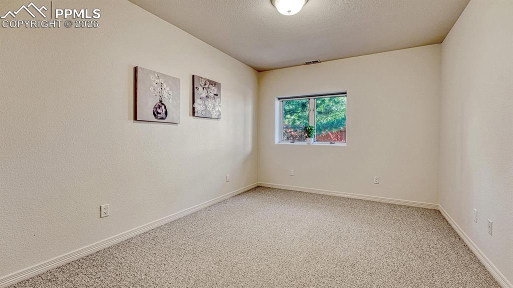 Image 29 of 38: Bedroom