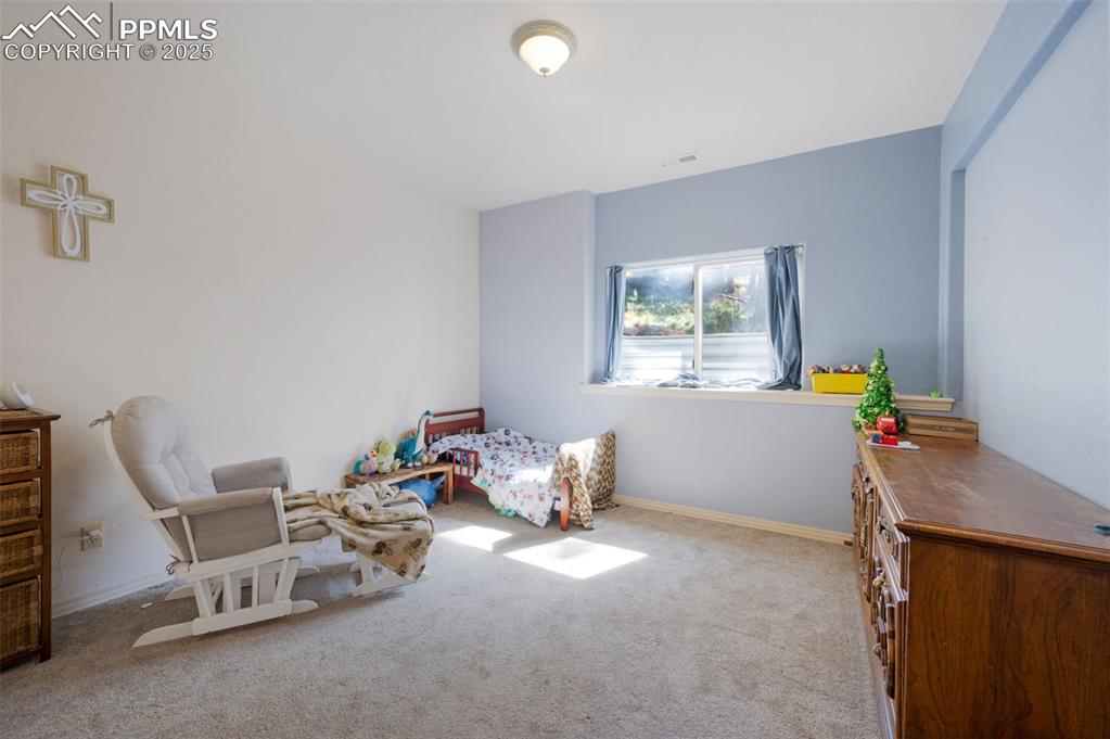 Image 21 of 39: Bedroom