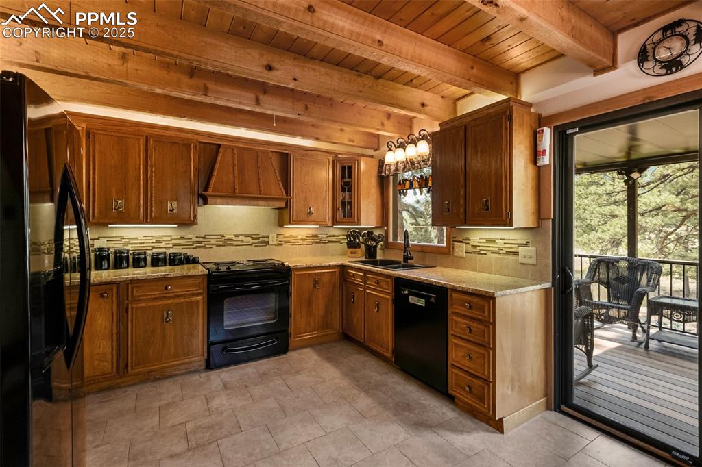 Image 12 of 50: Stunning granite countertops and ceramic floors