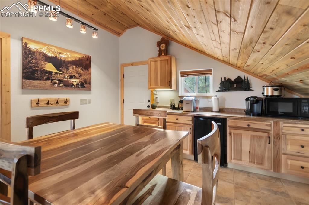 Image 35 of 50: large kitchen and dining area in cabin 2