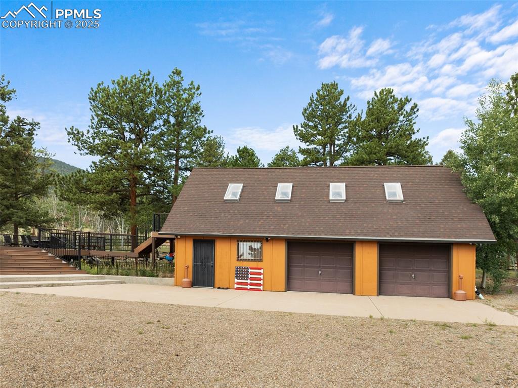 Image 40 of 50: Front view of cabin 1 with garage