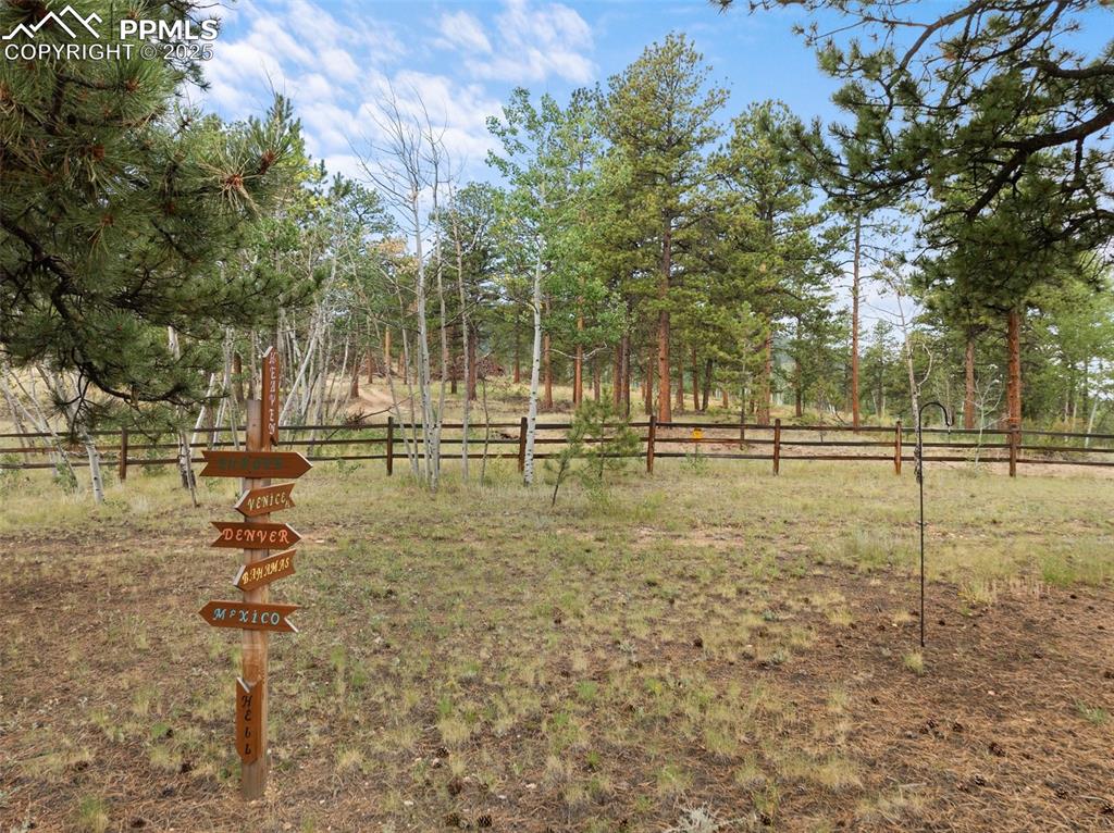 Image 43 of 50: Fully fenced, and 3 sides border USFS - Pike National Forest