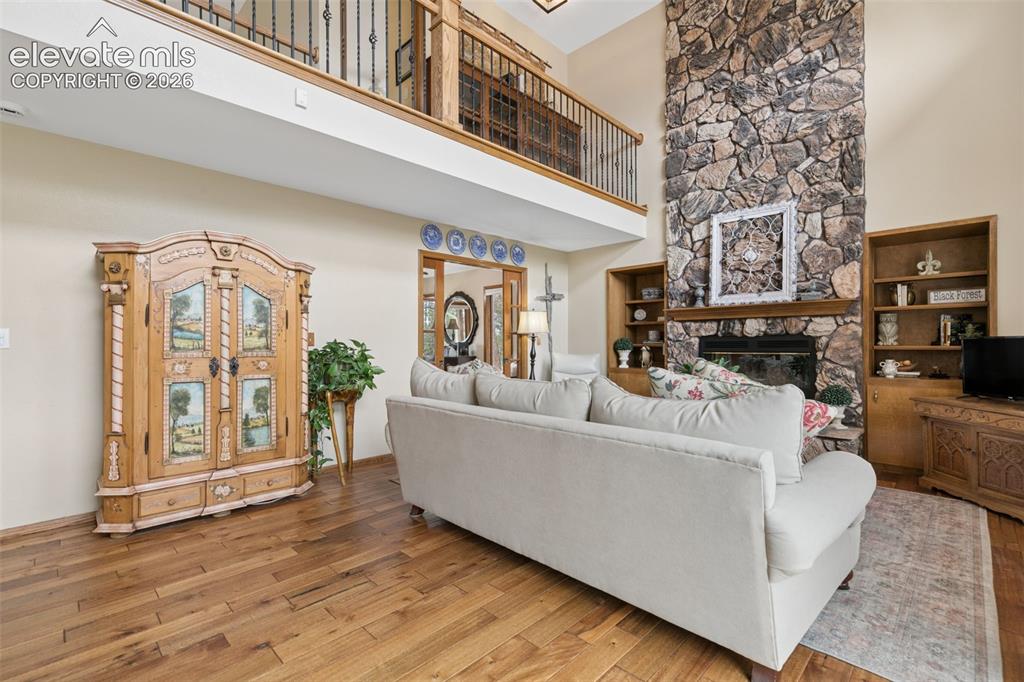 Image 11 of 50: Open Floor Plan with Gorgeous Hardwood Floors