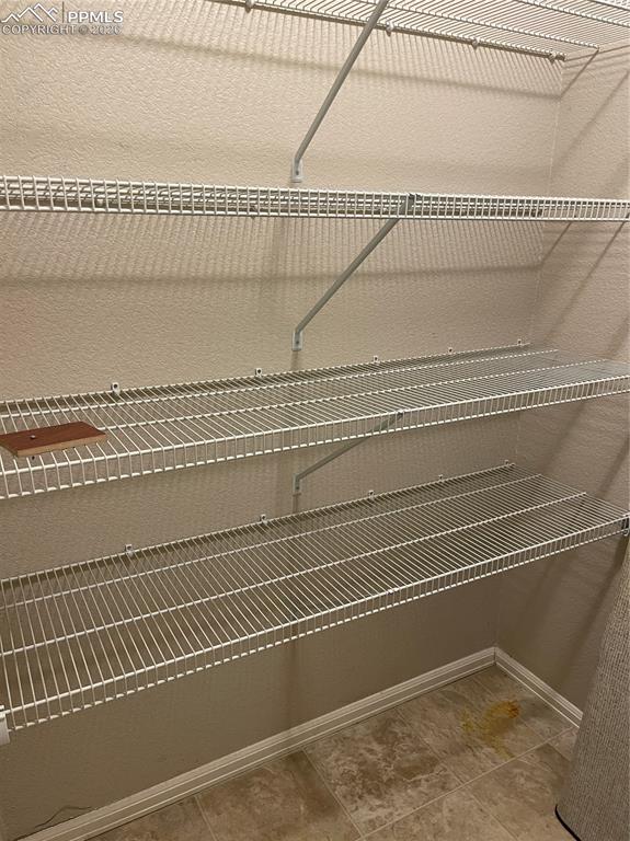 Image 10 of 15: Built-in wire shelving system with multiple tiers