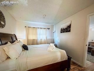 Image 13 of 21: Bedroom