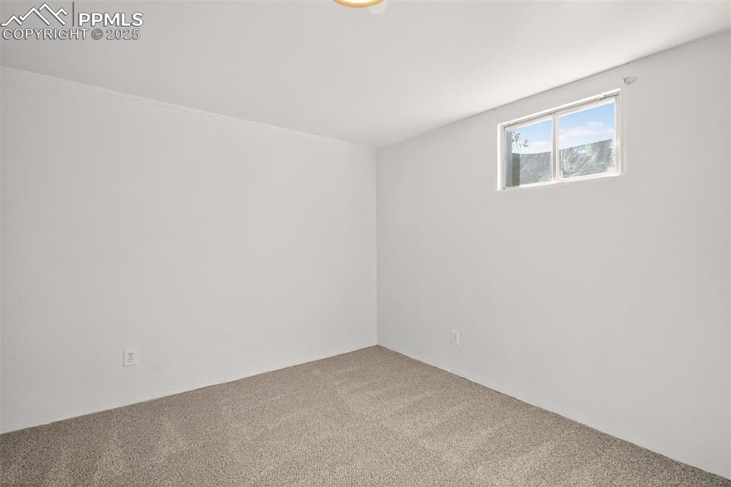Image 13 of 17: View of carpeted lower family room