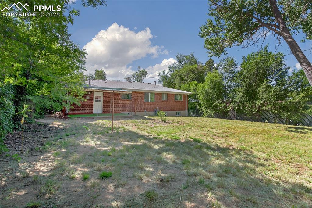 Image 17 of 17: View of back lawn