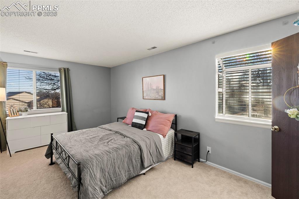 Image 14 of 23: Bedroom