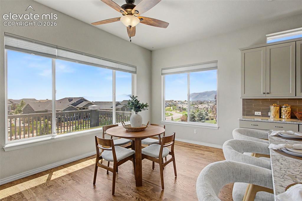 Image 12 of 50: Kitchen nook with amazing views out of every window!