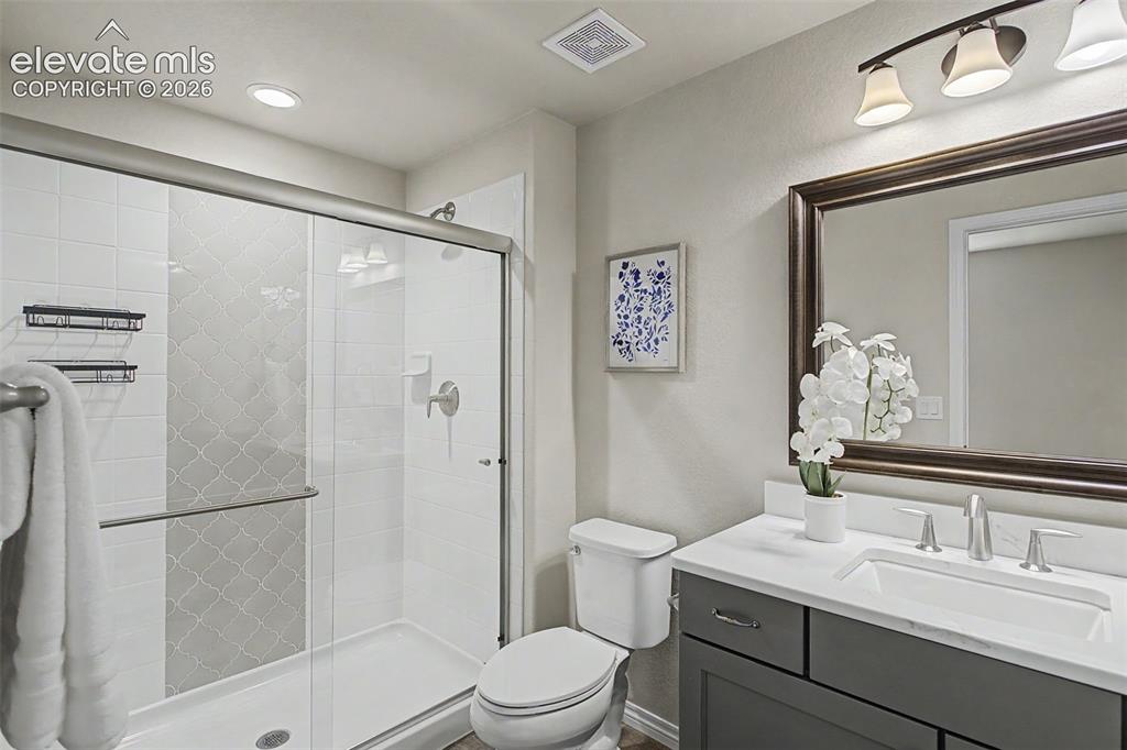 Image 36 of 50: En-suite basement bathroom