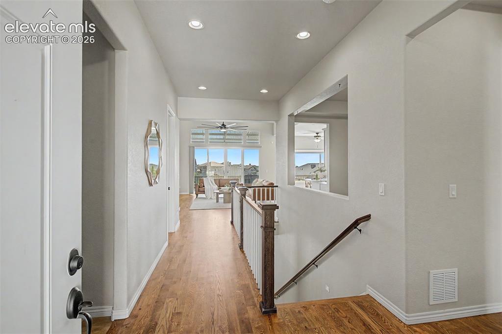 Image 5 of 50: Entry with light from front to the back of the home.