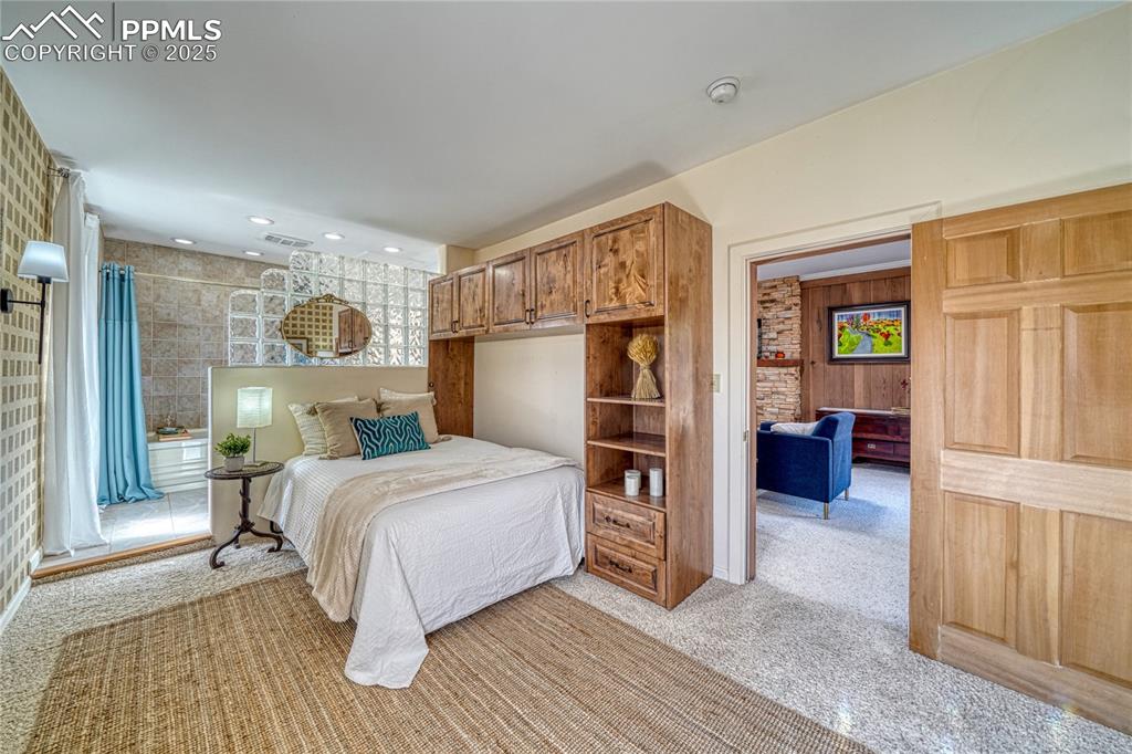 Image 15 of 37: Main Floor Primary-Murphy bed included
