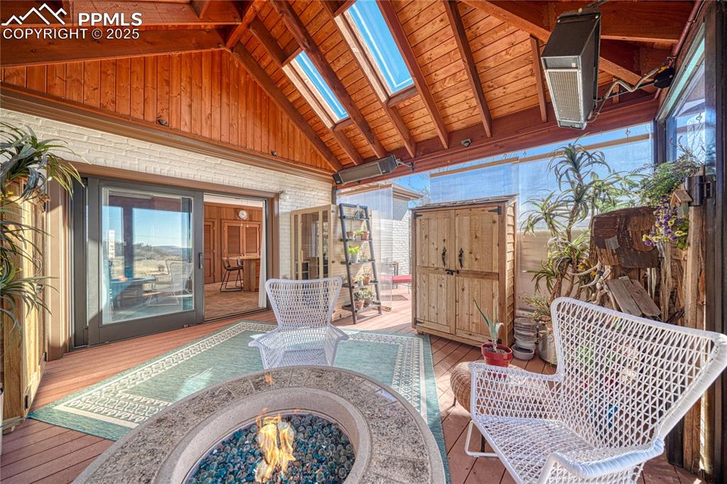 Image 18 of 37: Fire pit and sauna included