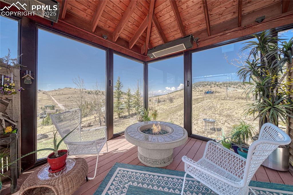 Image 19 of 37: Heated sun room