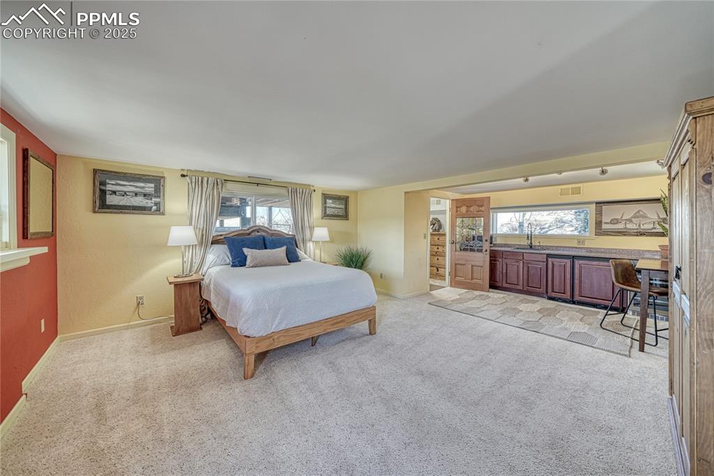 Image 25 of 37: Bedroom with Kitchenette. Separate entrance.